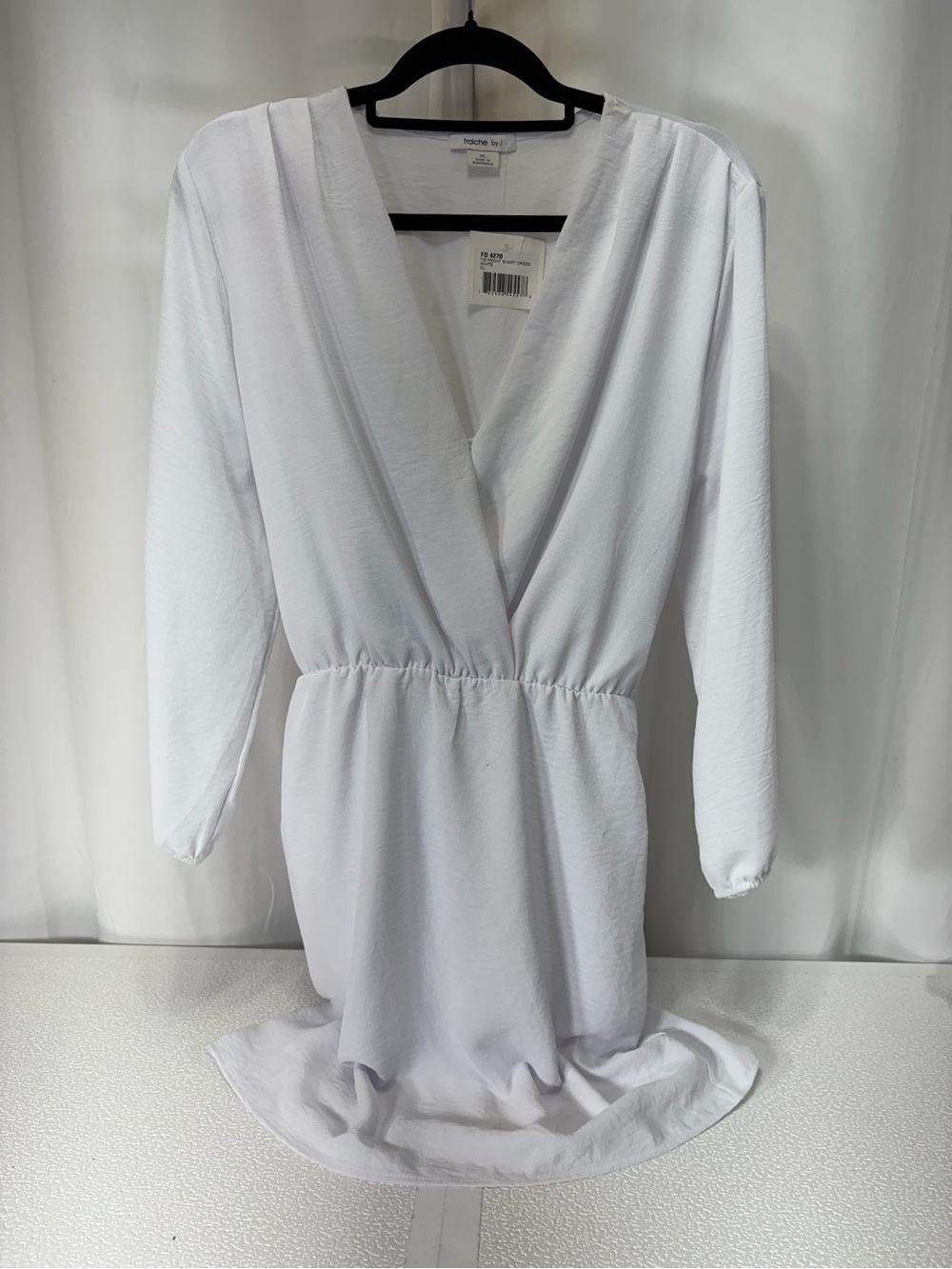 Long Sleeve Surplice Mini Dress in White 4172